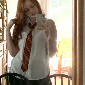 White Sleeveless Button Down Blouse